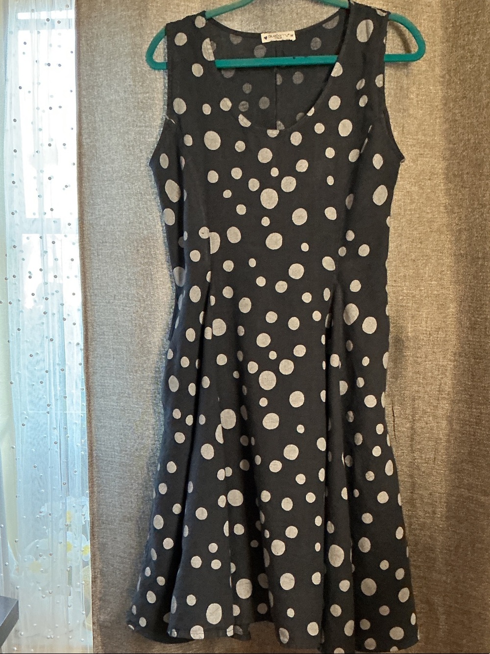 Blueberry And Classic Black Sleeveless Dress With White Polka dots A Retro Look